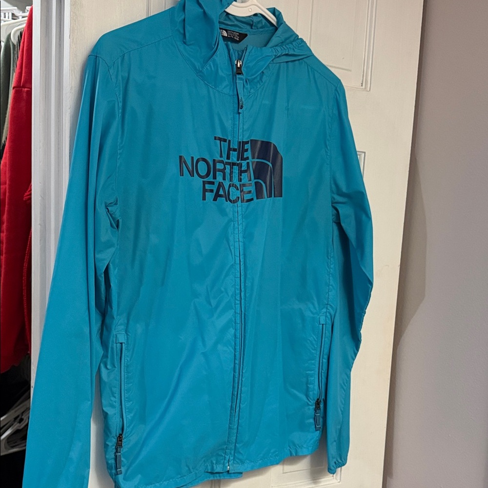 The North Face bluish  Teal Hooded rain Jacket